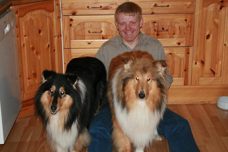 Picture of owner with dogs